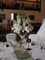 Martini vase of oriental liliies, orchids and freesias.