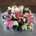 Lilly, rose and orchid dome arrangment