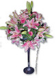 Pink Lillies and roses in a martini vase