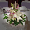Rose, orchids and lillies table arrangement