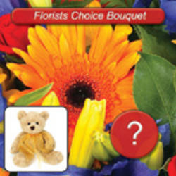 bouquet of flowers and teddy